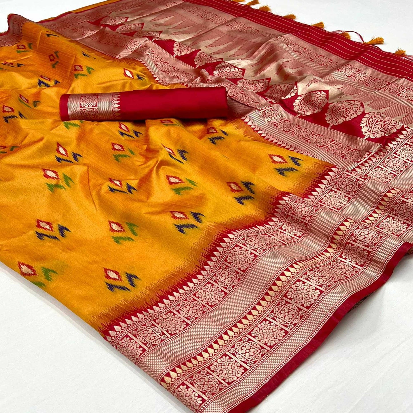 Mustard Ikkat Handwoven Art Silk Saree With Tassels