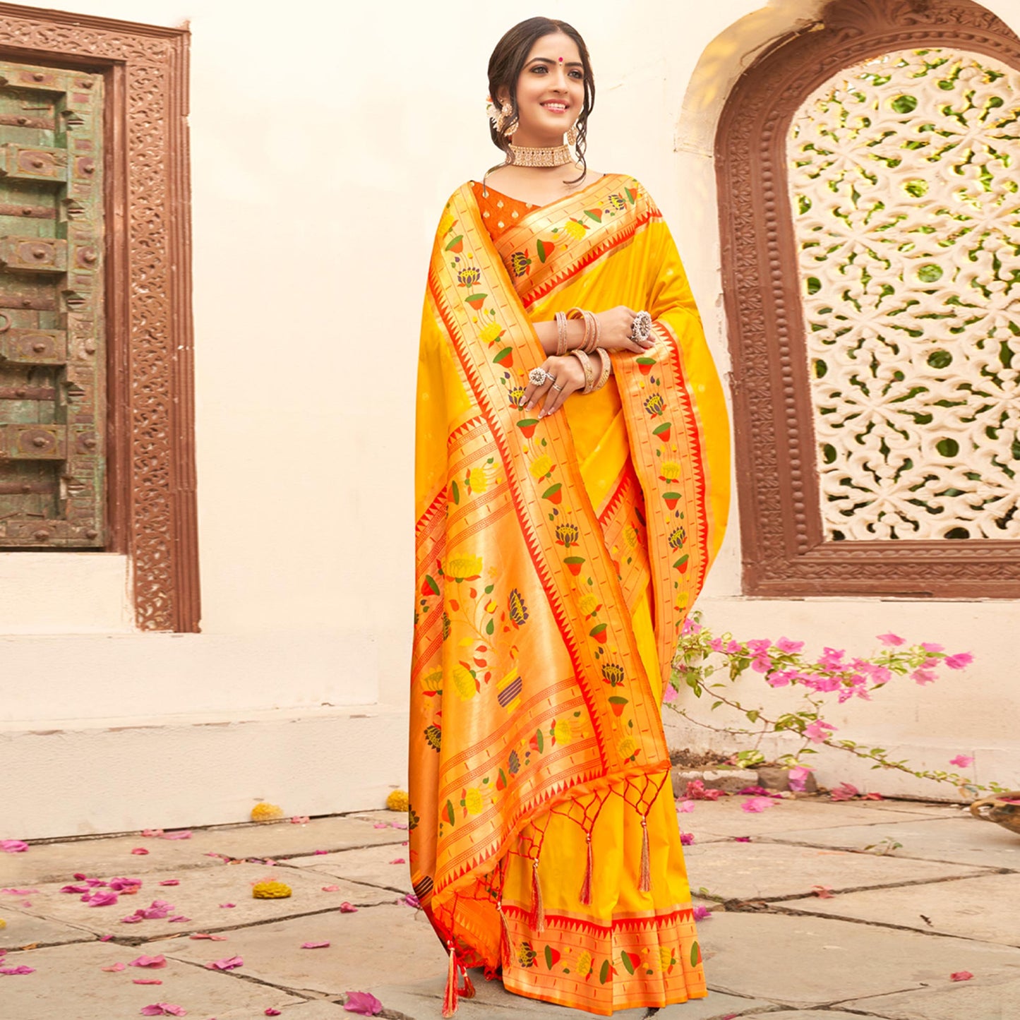 Yellow Floral Woven Banarasi Silk Saree With Tassels