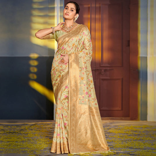 Light Green Floral Woven Banarasi Silk Saree With Tassels