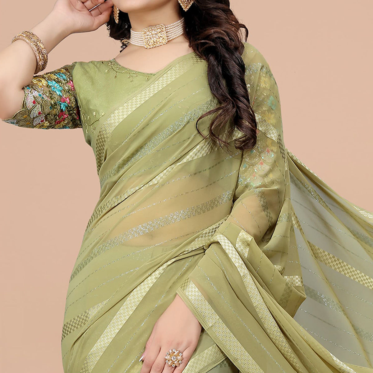 Green Zari Woven Georgette Saree With Tassels