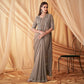 Beige Sequins Embroidered Georgette Saree With Tassels