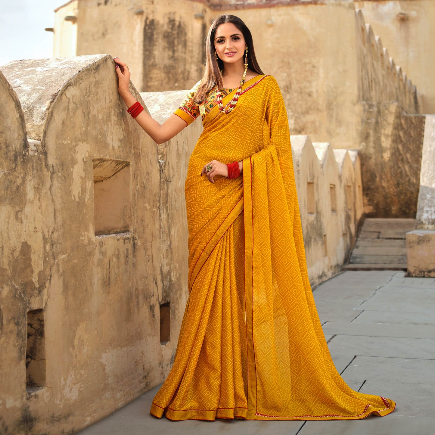 Yellow Bandhani Printed With Embroidered Border Chiffon Saree