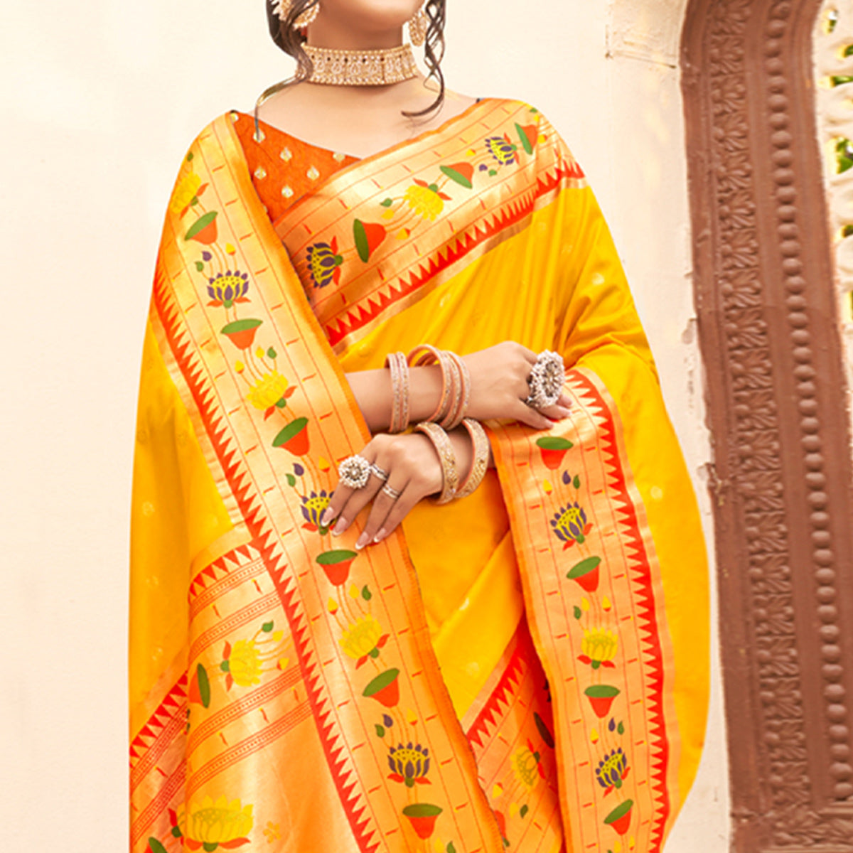 Yellow Floral Woven Banarasi Silk Saree With Tassels