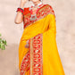 Yellow Woven Patola Banarasi Silk Saree With Tassels