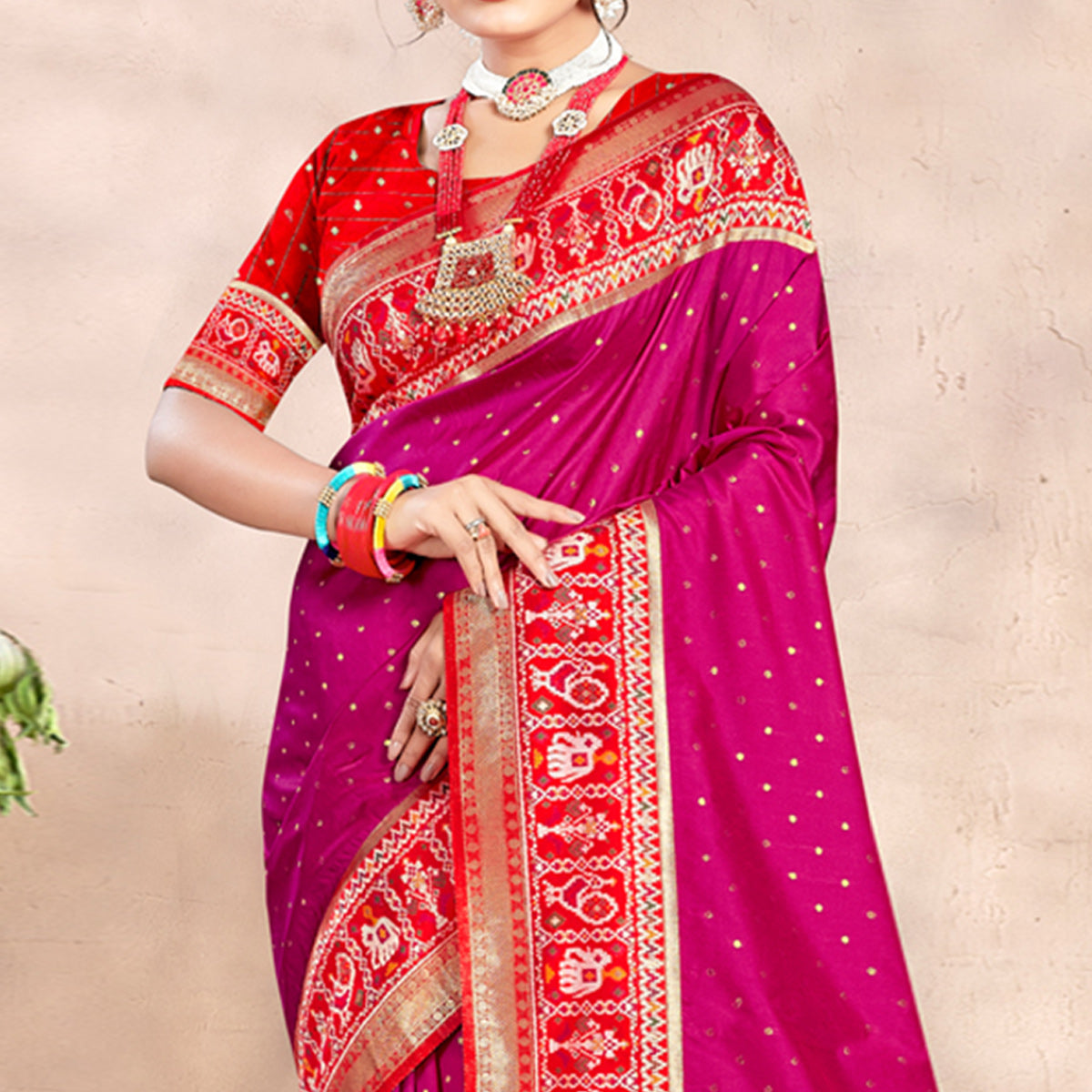 Magenta Pink Woven Patola Banarasi Silk Saree With Tassels