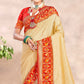 Cream Woven Patola Banarasi Silk Saree With Tassels