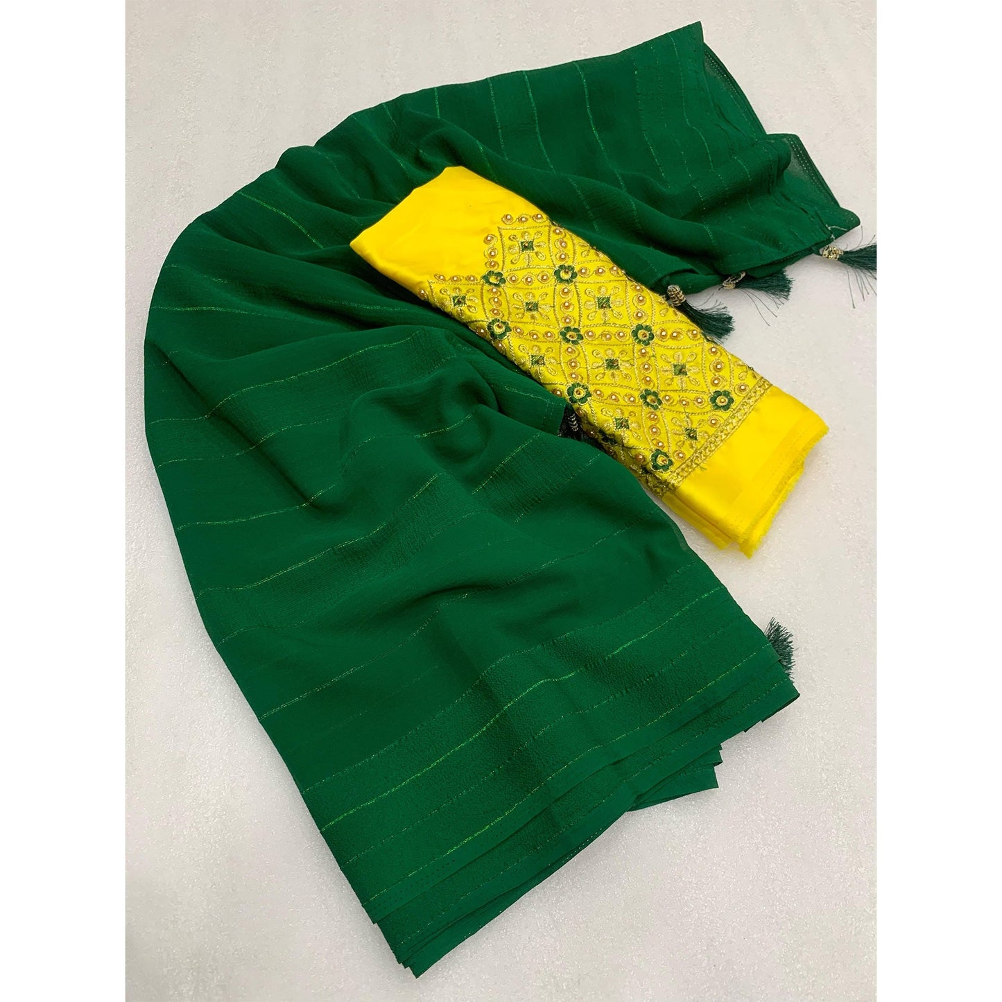 Green Zari Woven Georgettte Saree With Tassels