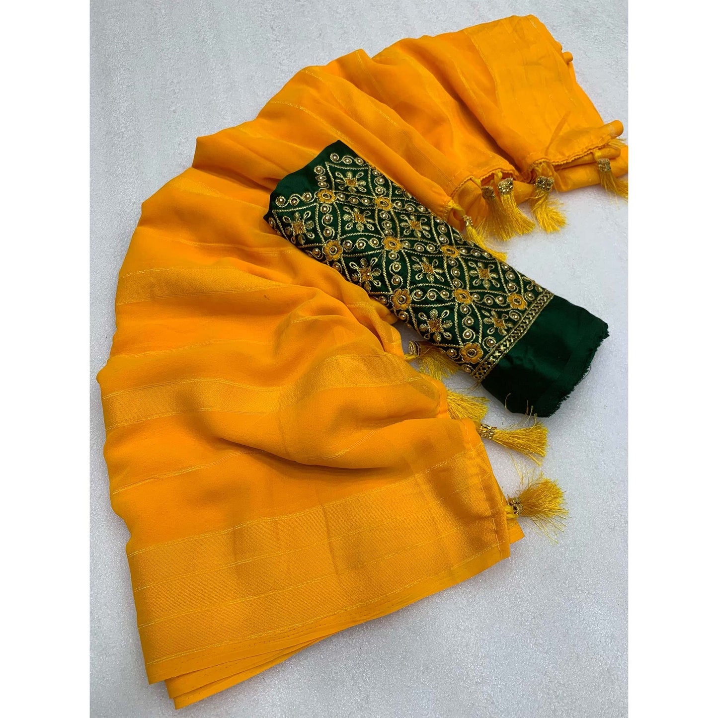 Mustard Zari Woven Georgettte Saree With Tassels