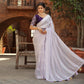 Light Lavender Zari Woven Georgette Saree With Tassels