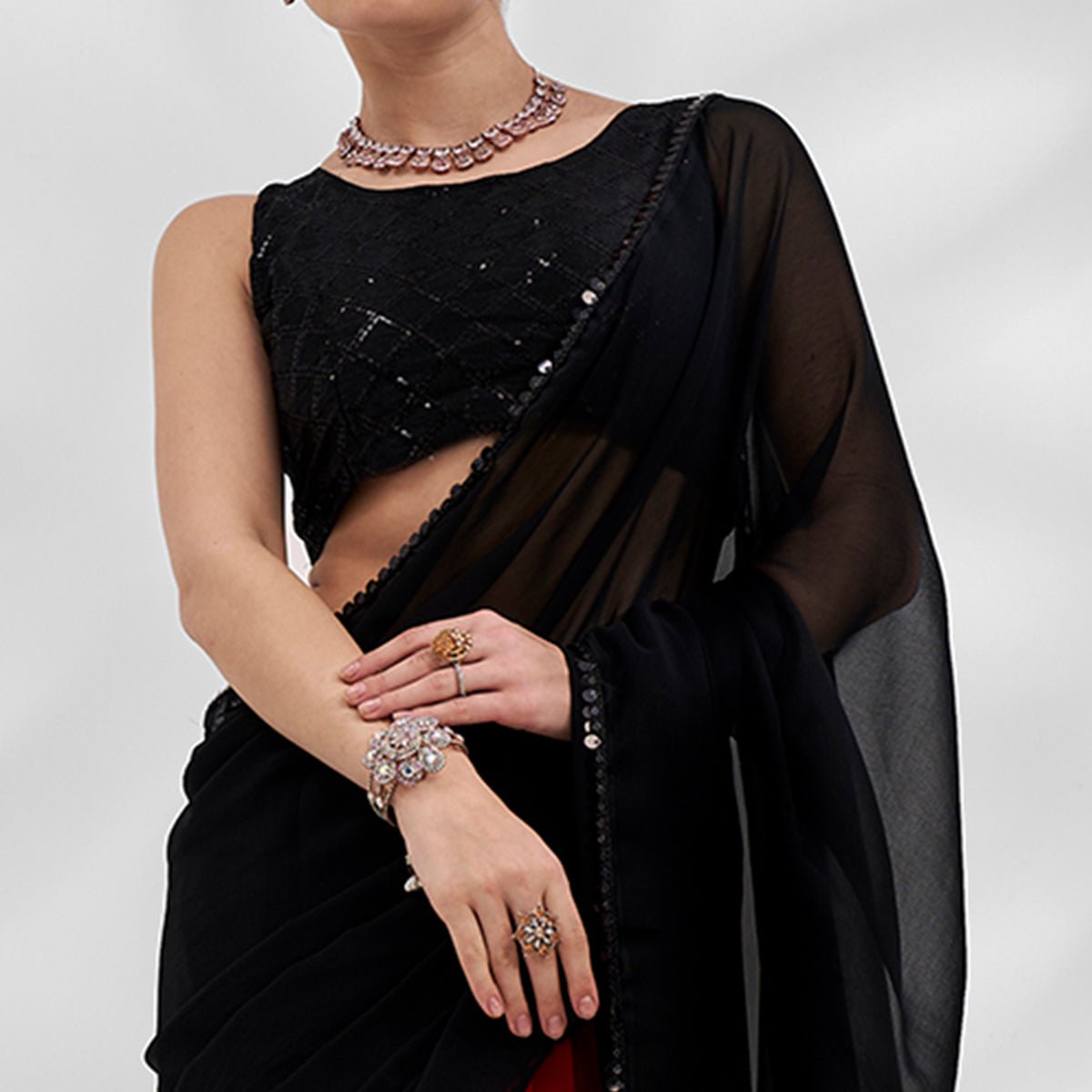 Black & Red Solid Georgette Saree