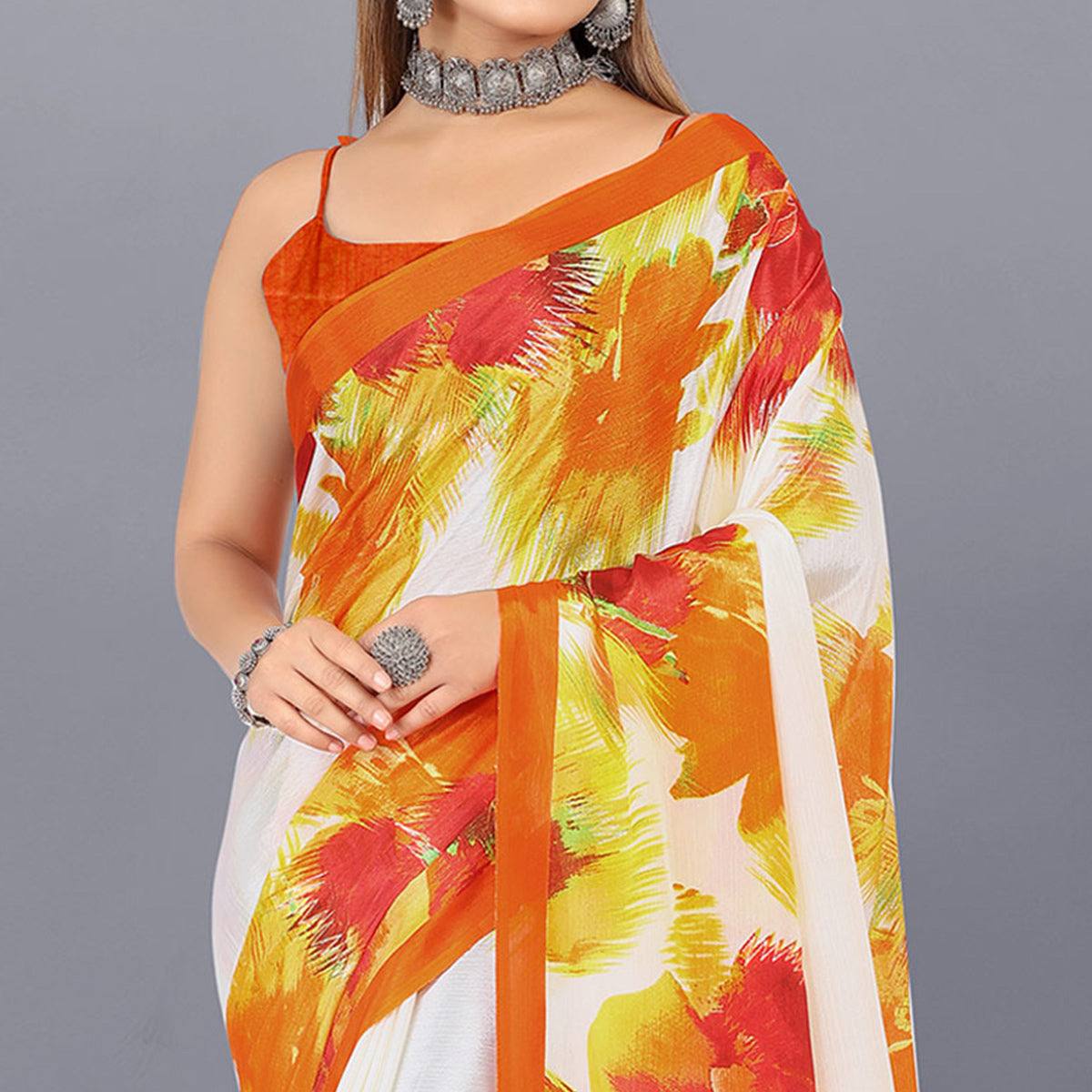 Off White & Orange Foil Printed Chiffon Saree With Tassels