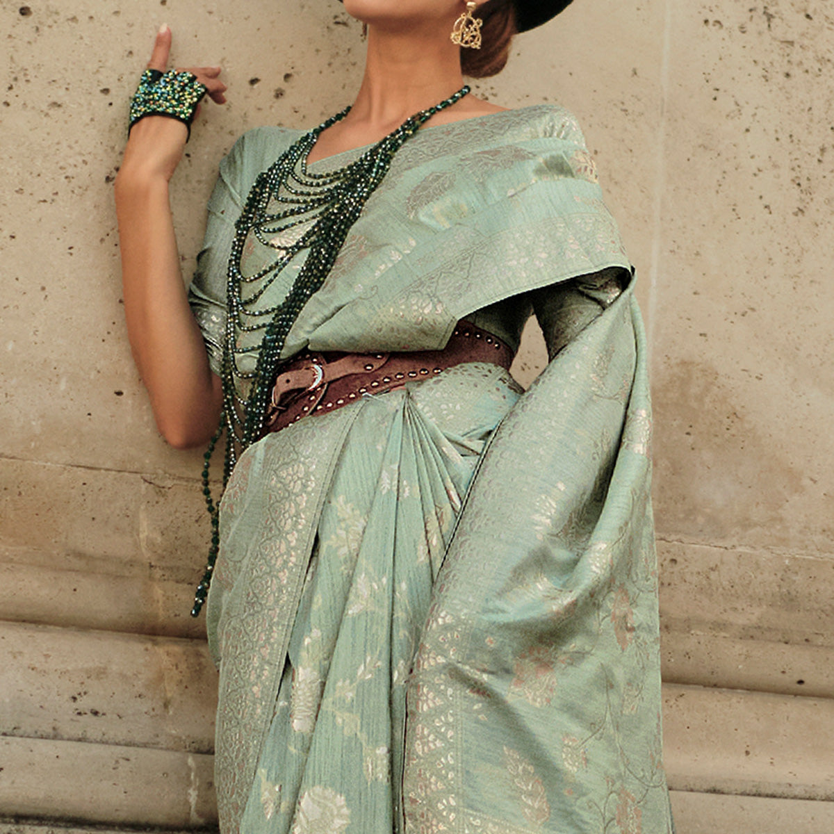 Turquoise Green Floral Woven Art Silk Saree With Tassels