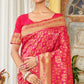 Magenta Floral Woven Banarasi Silk Saree With Tassels