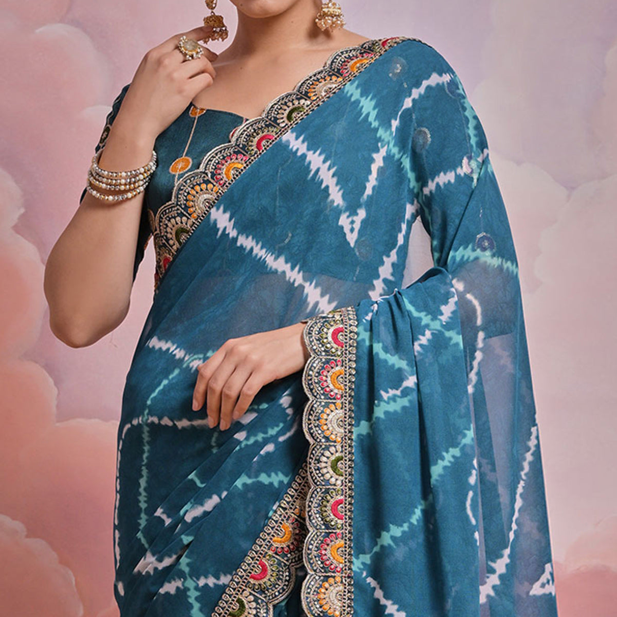 Teal  Printed With Embroidered Border Georgette Saree