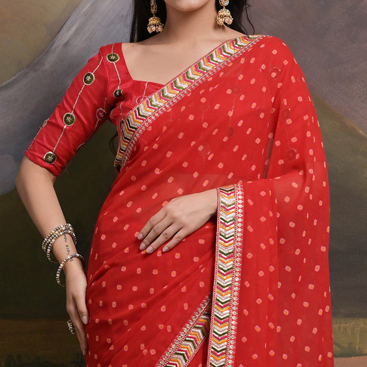 Red Bandhej Printed Georgette Saree With Tassels