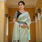 Light Green Zari Woven Georgette Saree With Tassels