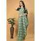 Green Zari Striped Georgette Saree With Tassels