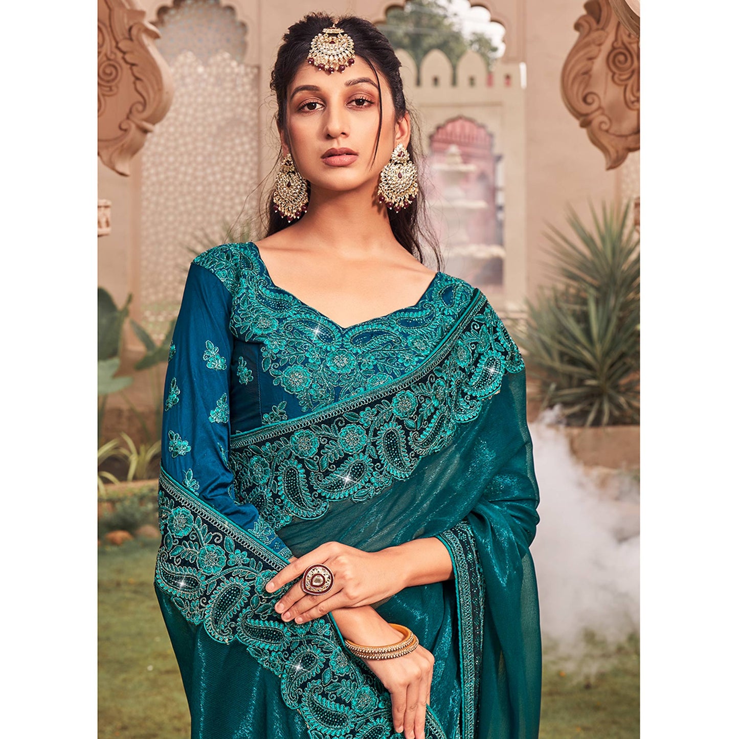 Teal Solid With Embroidered Border Chiffon Saree