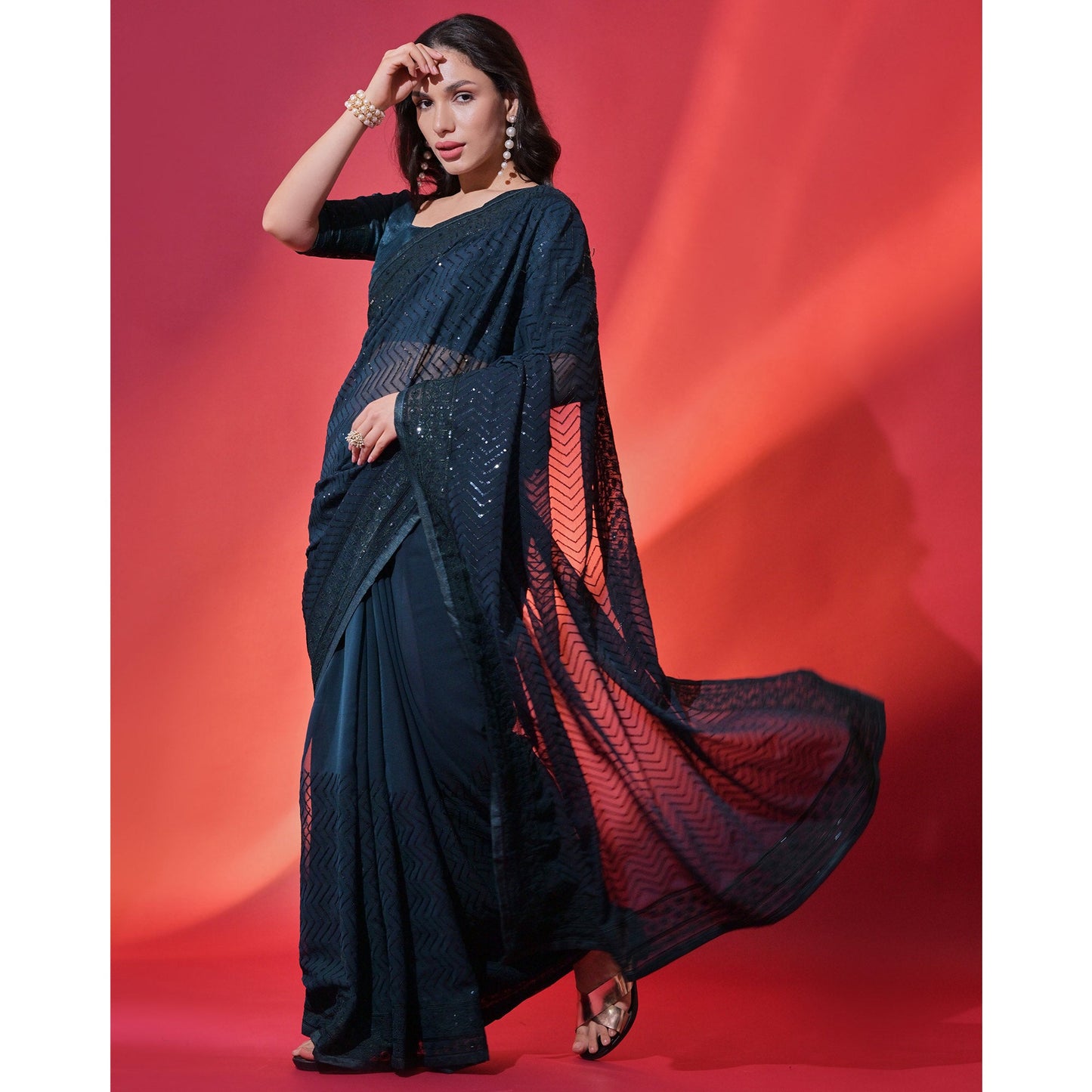 Teal Sequins Embroidered Georgette Saree