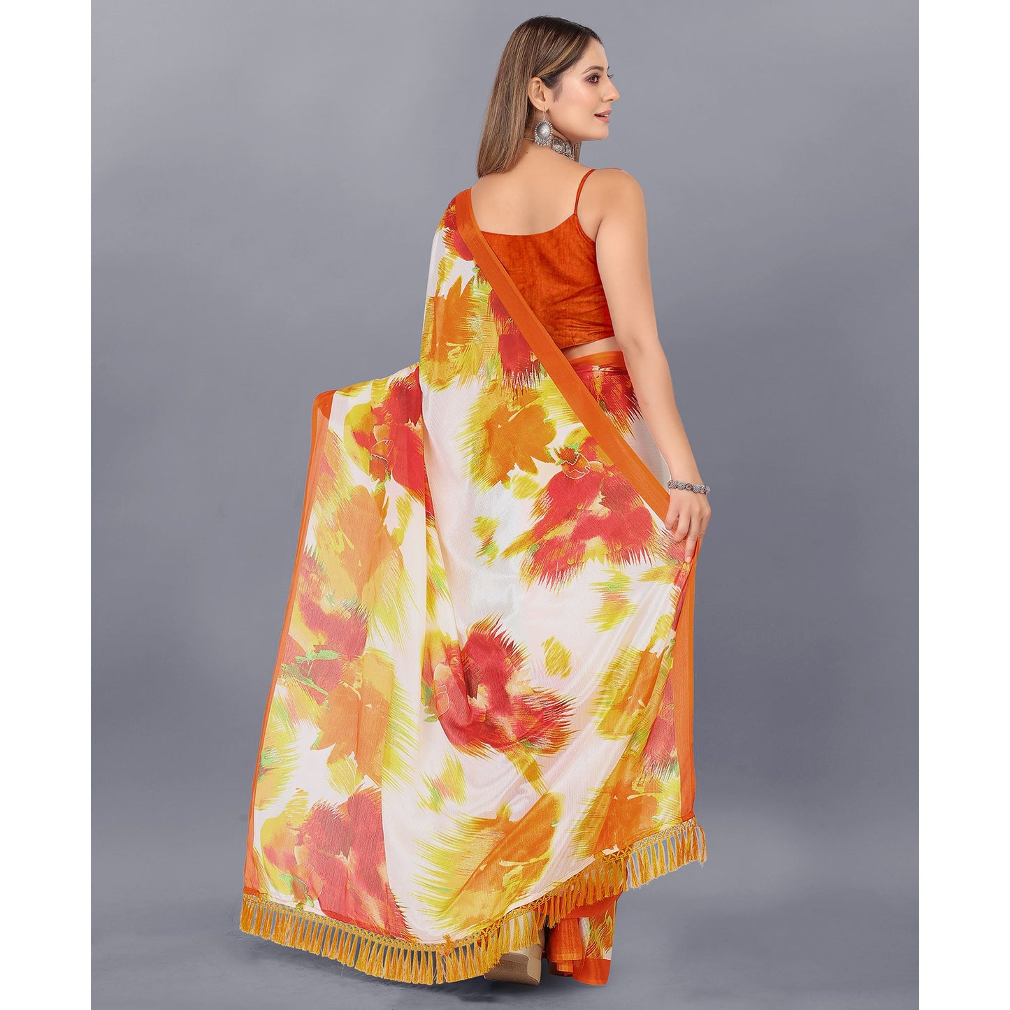 Off White & Orange Foil Printed Chiffon Saree With Tassels