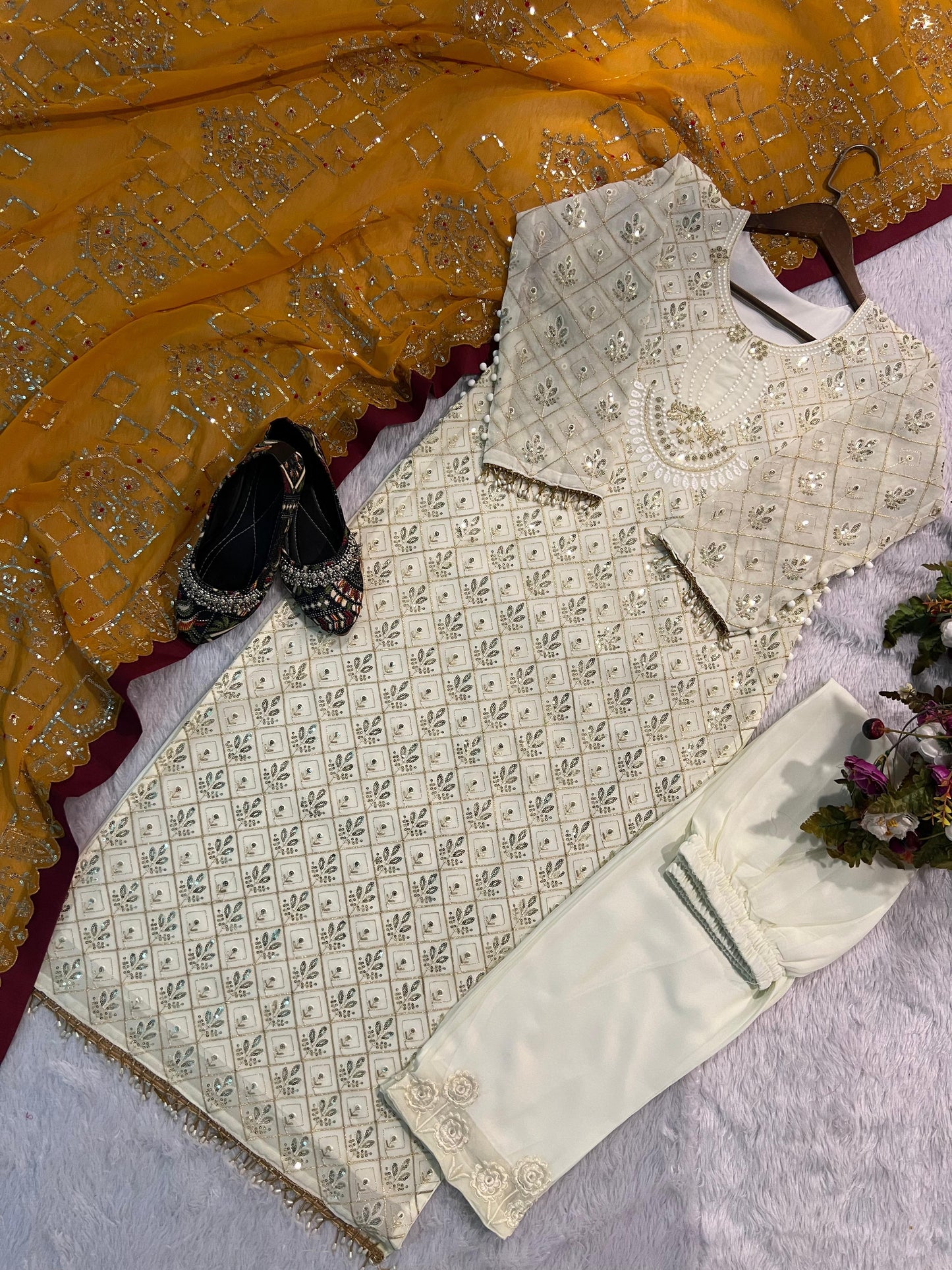 Glittering Charm:  Georgette Sequined Embroidered Top and Pant Set with Gold Orange Dupatta