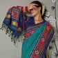 Firozi Blue Printed Patola Art Silk Saree With Tassels