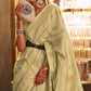 Cream Woven Art Silk Saree With Tassels