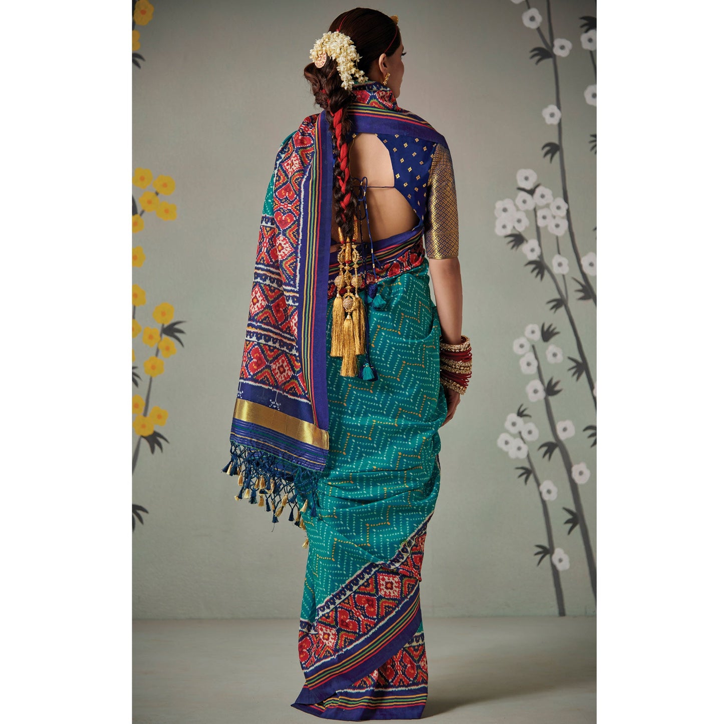 Firozi Blue Printed Patola Art Silk Saree With Tassels