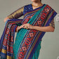 Firozi Blue Printed Patola Art Silk Saree With Tassels