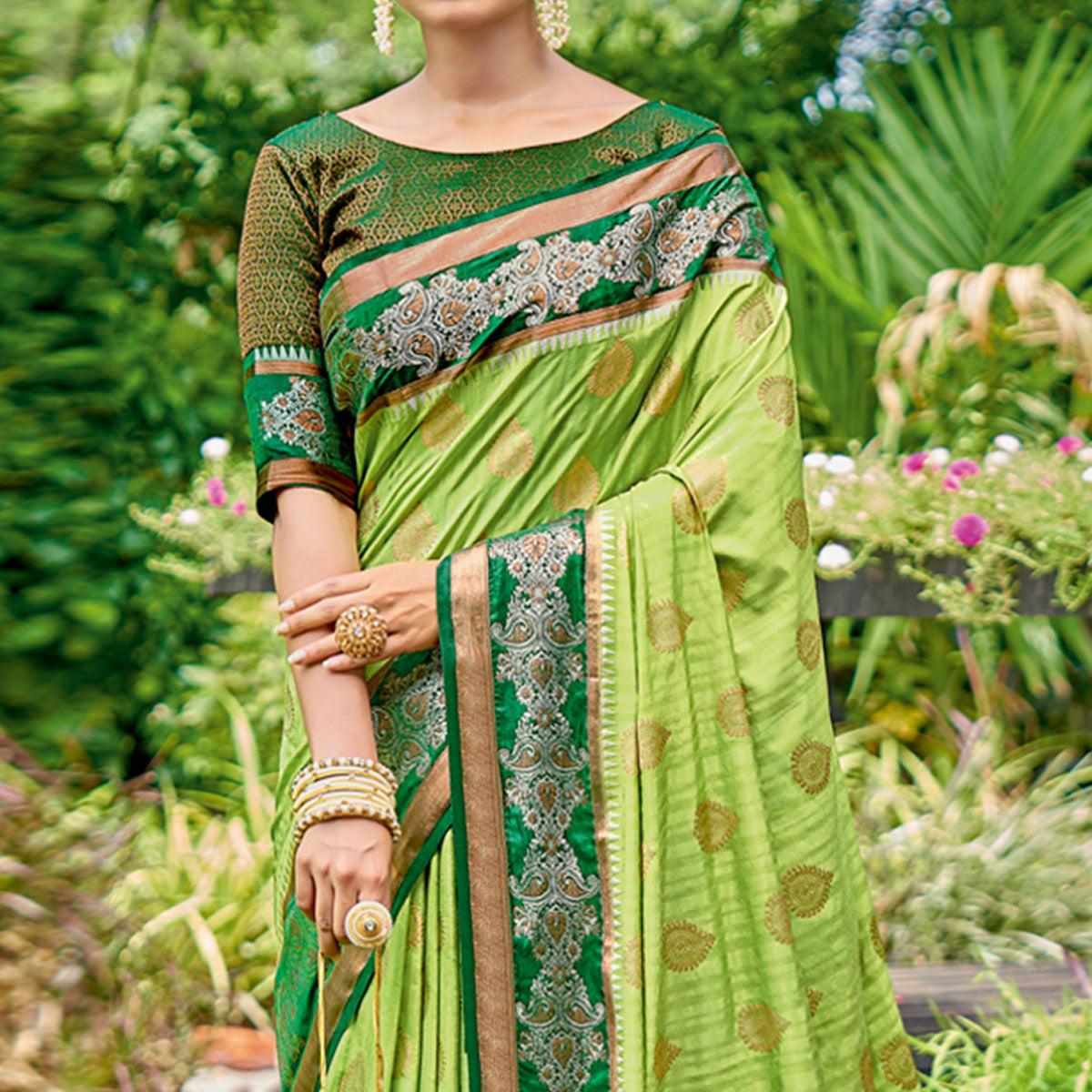 Green Woven Banarasi Silk Saree With Tassels