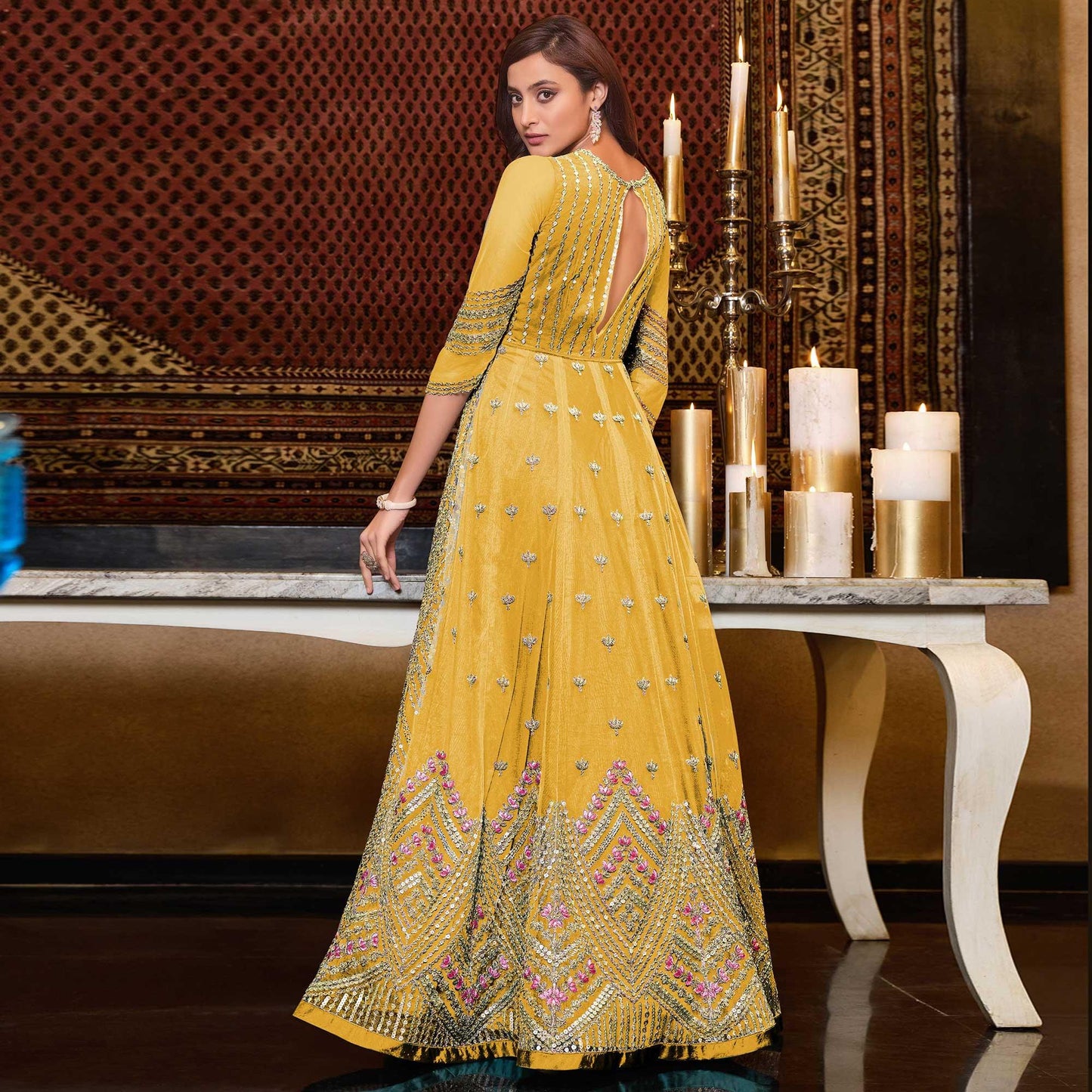 Yellow Designer Partywear Embroidered Heavy Net Anarakali Suit